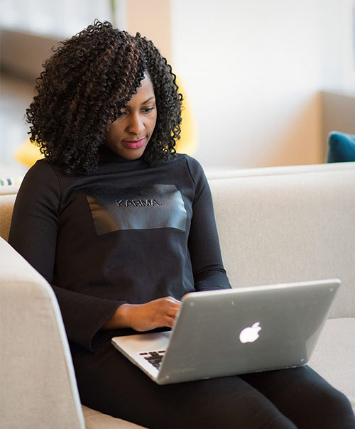Woman using Macbook laptop, taking screenshot
