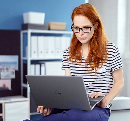 Woman using Dell Windows Laptop, taking screenshot