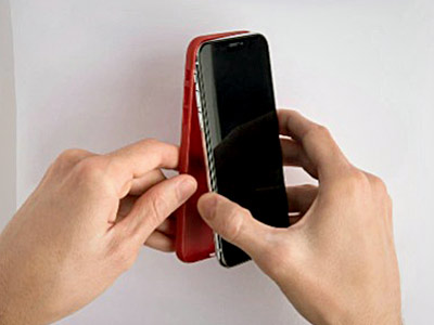 Person taking off Phone Case